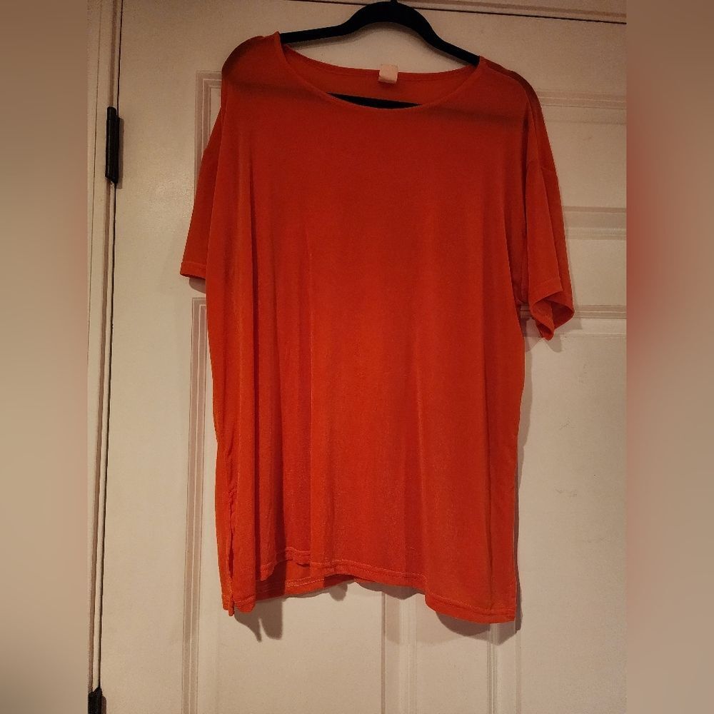 Super stretchy coral colored oversized t shirt L